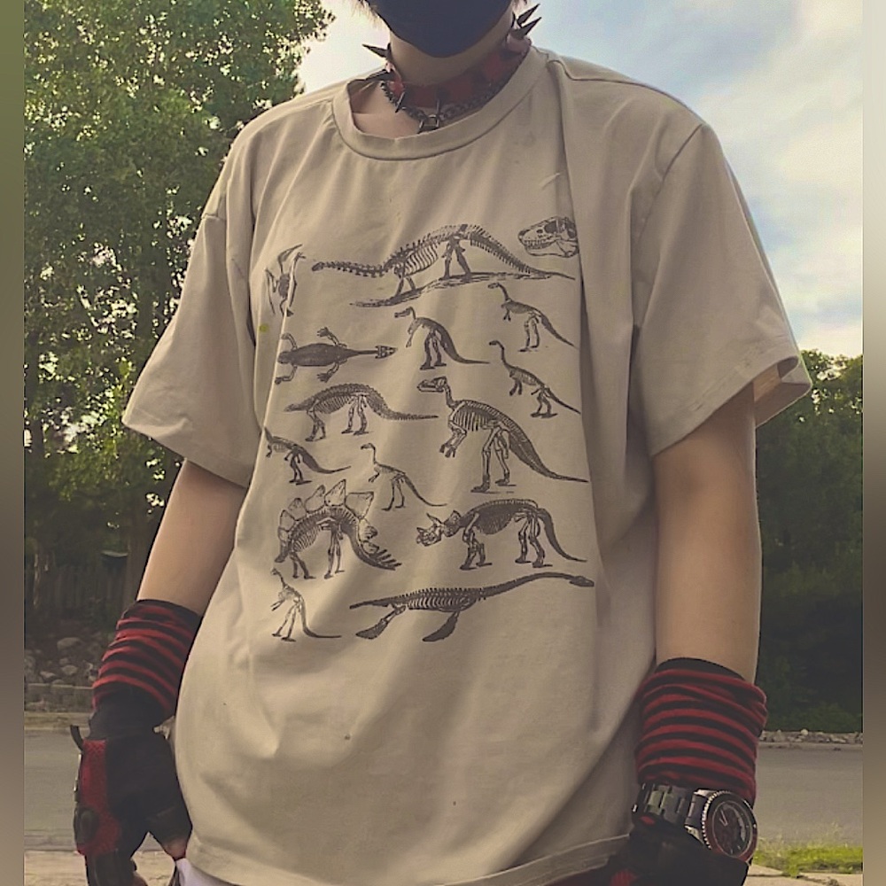Tan and brown dinosaur skeletons shirt